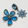 Handgemaakt statement oorbel earrings blue swarovski flower handgemaakt door MUZE earrings. Gratis geleverd binnen nederland en belgie.