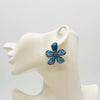 Handgemaakt statement oorbel earrings blue swarovski flower handgemaakt door MUZE earrings. Gratis geleverd binnen nederland en belgie.