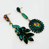 Handgemaakt statement oorbel earrings green peacock handgemaakt door MUZE earrings. Gratis geleverd binnen nederland en belgie.