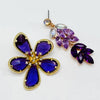 Handgemaakt statement oorbel earrings purple swarovski flower handgemaakt door MUZE earrings. Gratis geleverd binnen nederland en belgie.