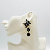 Handgemaakt statement oorbel black grey spring handgemaakt door MUZE earrings. Gratis geleverd binnen nederland en belgie.