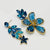 Handgemaakt statement oorbel blue swarovski flower handgemaakt door MUZE earrings. Gratis geleverd binnen nederland en belgie.