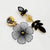 Handgemaakt statement oorbel clip blooming black grey handgemaakt door MUZE earrings. Gratis geleverd binnen nederland en belgie.