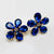 Handgemaakt statement oorbel clips mirrored cobalt flower handgemaakt door MUZE earrings. Gratis geleverd binnen nederland en belgie.