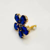 Handgemaakt statement oorbel clips mirrored cobalt flower handgemaakt door MUZE earrings. Gratis geleverd binnen nederland en belgie.