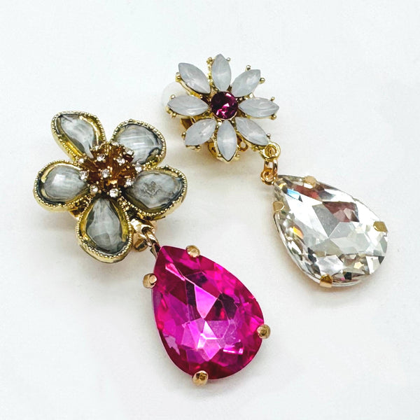 Handgemaakt statement oorbel clips pink white flower handgemaakt door MUZE earrings. Gratis geleverd binnen nederland en belgie.