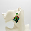 Handgemaakt statement oorbel colorful green spring handgemaakt door MUZE earrings. Gratis geleverd binnen nederland en belgie.