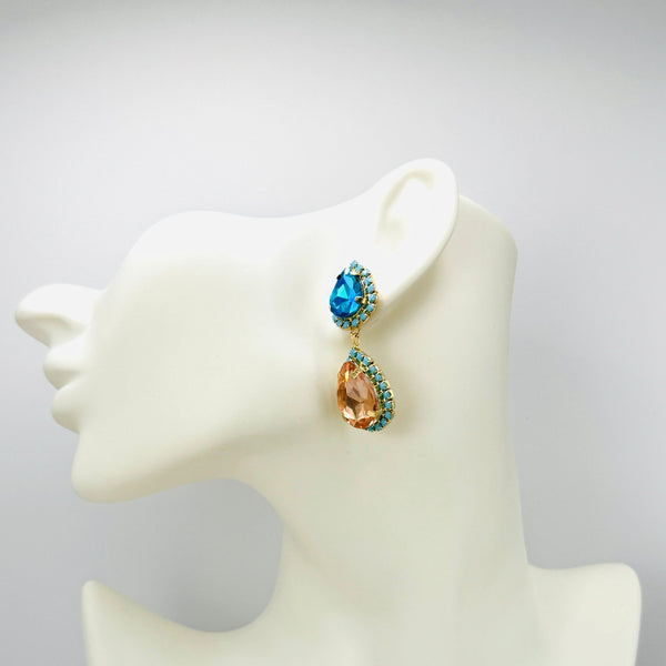 Handgemaakt statement oorbel earrings aqua peach glam handgemaakt door MUZE earrings. Gratis geleverd binnen nederland en belgie.