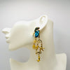 Handgemaakt statement oorbel earrings aqua sea treasures handgemaakt door MUZE earrings. Gratis geleverd binnen nederland en belgie.