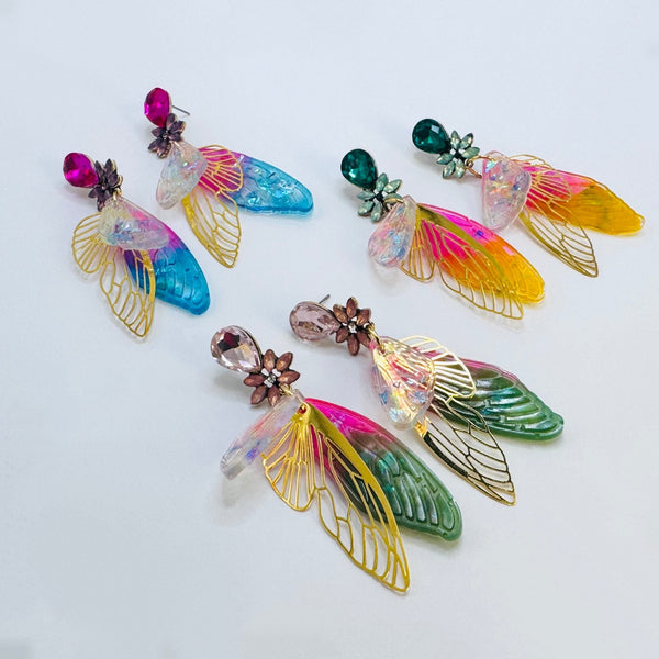 Handgemaakt statement oorbel earrings mirrored festival butterfly handgemaakt door MUZE earrings. Gratis geleverd binnen nederland en belgie.