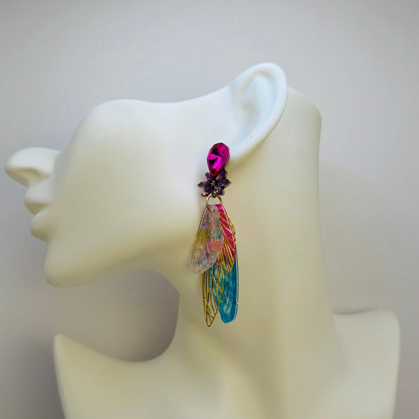 Handgemaakt statement oorbel earrings mirrored festival butterfly handgemaakt door MUZE earrings. Gratis geleverd binnen nederland en belgie.