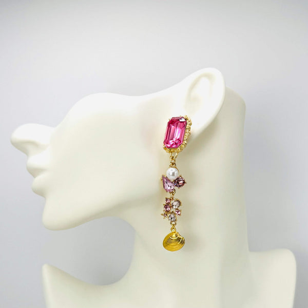 Handgemaakt statement oorbel earrings pearl pink cockle handgemaakt door MUZE earrings. Gratis geleverd binnen nederland en belgie.