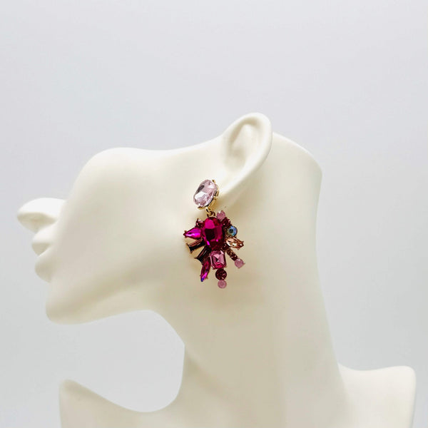 Handgemaakt statement oorbel earrings pink fuchsia spring handgemaakt door MUZE earrings. Gratis geleverd binnen nederland en belgie.