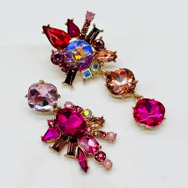 Handgemaakt statement oorbel earrings pink fuchsia spring handgemaakt door MUZE earrings. Gratis geleverd binnen nederland en belgie.