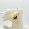 Handgemaakt statement oorbel earrings red strass crab handgemaakt door MUZE earrings. Gratis geleverd binnen nederland en belgie.