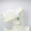 Handgemaakt statement oorbel earrings starfish cockle handgemaakt door MUZE earrings. Gratis geleverd binnen nederland en belgie.