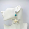 Handgemaakt statement oorbel earrings starfish cockle handgemaakt door MUZE earrings. Gratis geleverd binnen nederland en belgie.
