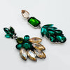 Handgemaakt statement oorbel green spring leafs handgemaakt door MUZE earrings. Gratis geleverd binnen nederland en belgie.