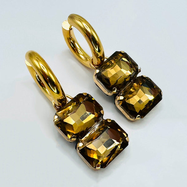 Handgemaakt statement oorbel earrings mirrored champagne hoop handgemaakt door MUZE earrings. Gratis geleverd binnen nederland en belgie.