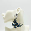 Handgemaakt statement oorbel earrings aqua butterfly handgemaakt door MUZE earrings. Gratis geleverd binnen nederland en belgie.