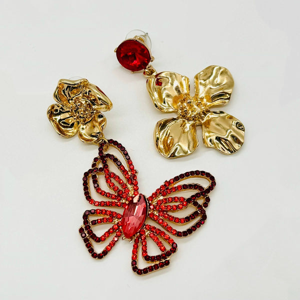 Handgemaakt statement oorbel earrings big red butterfly handgemaakt door MUZE earrings. Gratis geleverd binnen nederland en belgie.
