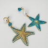 Handgemaakt statement oorbel earrings aqua starfish handgemaakt door MUZE earrings. Gratis geleverd binnen nederland en belgie.