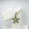 Handgemaakt statement oorbel earrings aqua starfish handgemaakt door MUZE earrings. Gratis geleverd binnen nederland en belgie.