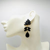 Handgemaakt statement oorbel black spring leafs handgemaakt door MUZE earrings. Gratis geleverd binnen nederland en belgie.