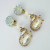 Handgemaakt statement oorbel clips pearl shell handgemaakt door MUZE earrings. Gratis geleverd binnen nederland en belgie.