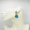 Handgemaakt statement oorbel earrings aqua peach glam handgemaakt door MUZE earrings. Gratis geleverd binnen nederland en belgie.