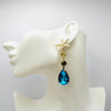 Handgemaakt statement oorbel earrings aqua sea treasures handgemaakt door MUZE earrings. Gratis geleverd binnen nederland en belgie.