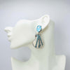 Handgemaakt statement oorbel earrings blue glam shell handgemaakt door MUZE earrings. Gratis geleverd binnen nederland en belgie.
