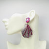 Handgemaakt statement oorbel earrings fuchsia pink shell handgemaakt door MUZE earrings. Gratis geleverd binnen nederland en belgie.