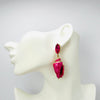 Handgemaakt statement oorbel earrings fuchsia towershell handgemaakt door MUZE earrings. Gratis geleverd binnen nederland en belgie.