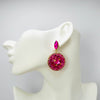 Handgemaakt statement oorbel earrings fuchsia towershell handgemaakt door MUZE earrings. Gratis geleverd binnen nederland en belgie.