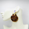 Handgemaakt statement oorbel earrings lilac leopard shell handgemaakt door MUZE earrings. Gratis geleverd binnen nederland en belgie.