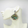Handgemaakt statement oorbel earrings luminescence shell handgemaakt door MUZE earrings. Gratis geleverd binnen nederland en belgie.