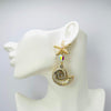 Handgemaakt statement oorbel earrings nautilus starfish handgemaakt door MUZE earrings. Gratis geleverd binnen nederland en belgie.
