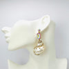 Handgemaakt statement oorbel earrings pearl strass cockle handgemaakt door MUZE earrings. Gratis geleverd binnen nederland en belgie.