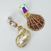 Handgemaakt statement oorbel earrings pearl strass cockle handgemaakt door MUZE earrings. Gratis geleverd binnen nederland en belgie.