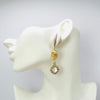Handgemaakt statement oorbel earrings pearly nautilus handgemaakt door MUZE earrings. Gratis geleverd binnen nederland en belgie.