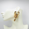 Handgemaakt statement oorbel earrings pink scorpion handgemaakt door MUZE earrings. Gratis geleverd binnen nederland en belgie.