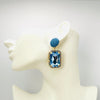 Handgemaakt statement oorbel earrings small blue denim handgemaakt door MUZE earrings. Gratis geleverd binnen nederland en belgie.
