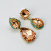 Handgemaakt statement oorbel earrings small peach glam handgemaakt door MUZE earrings. Gratis geleverd binnen nederland en belgie.