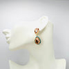 Handgemaakt statement oorbel earrings small peach glam handgemaakt door MUZE earrings. Gratis geleverd binnen nederland en belgie.