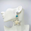 Handgemaakt statement oorbel earrings starfish cockle handgemaakt door MUZE earrings. Gratis geleverd binnen nederland en belgie.