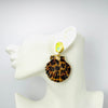 Handgemaakt statement oorbel earrings yellow leopard shell handgemaakt door MUZE earrings. Gratis geleverd binnen nederland en belgie.
